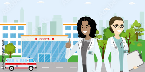 Modern Hospital building,ambulance car,couple of female doctors or nurse,