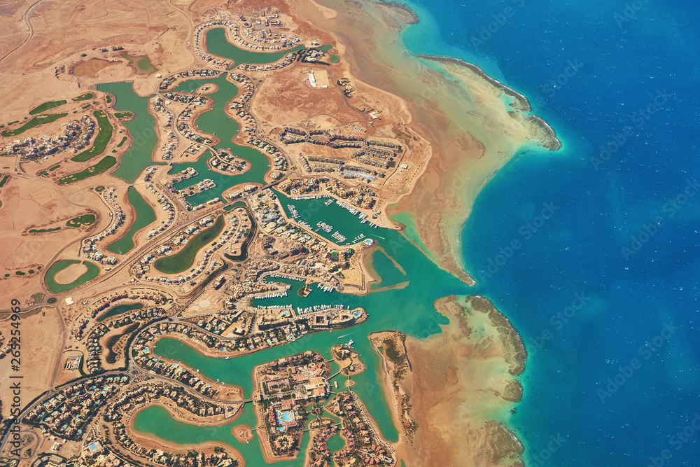 Aerial view of El Gouna a luxury Egyptian tourist resort located on the Red Sea 20 kilometres north of Hurghada. - obrazy, fototapety, plakaty 