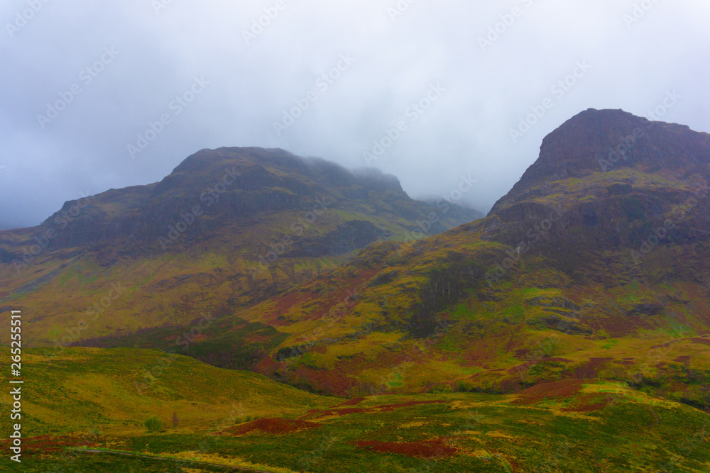 Landscape of the mountains of Glencoe, Lochaber, HIghlands, Scotland, UK in cloudy and foggy day