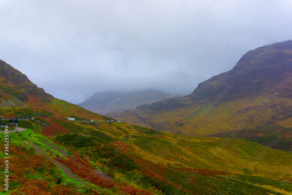 Fototapeta premium Landscape of the mountains of Glencoe, Lochaber, HIghlands, Scotland, UK in cloudy and foggy day