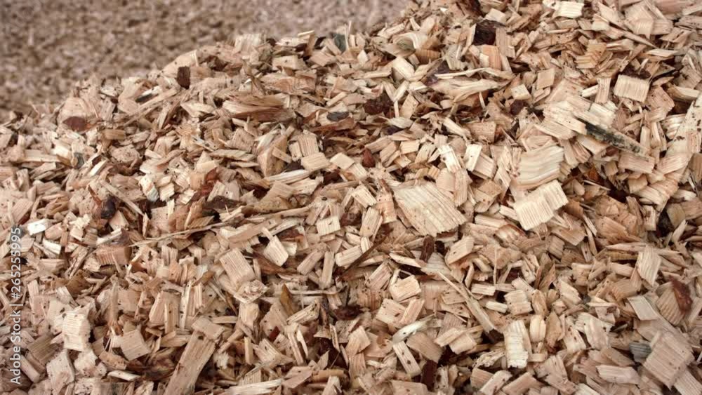 Sawdusts falling into heap during process of woodworking. Wooden sawdust Sawdusts falling into heap during process of woodworking. Wooden sawdust
