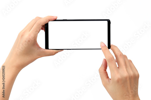 Hand holding modern smart phone with blank white screen for mockup