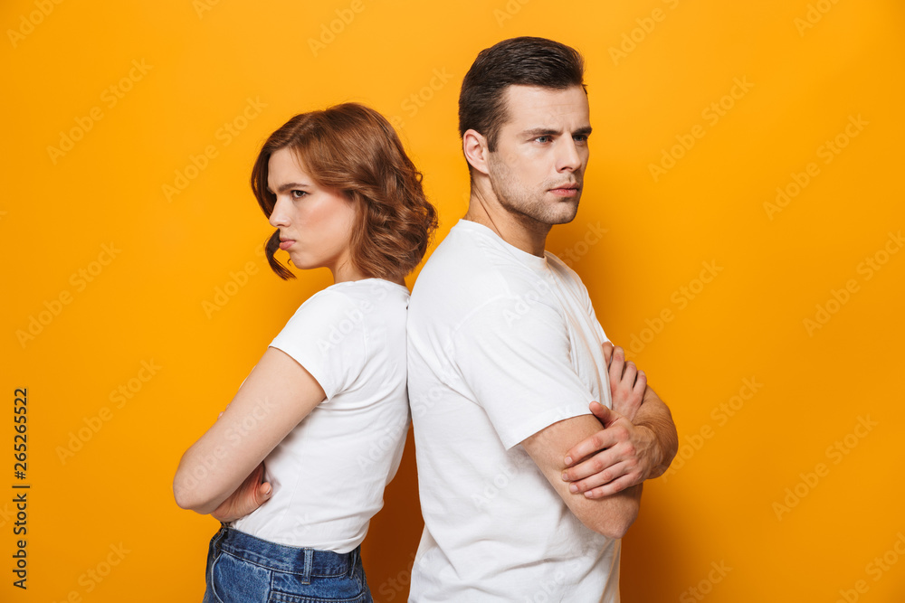 Angry beautiful couple wearing white t-shirts