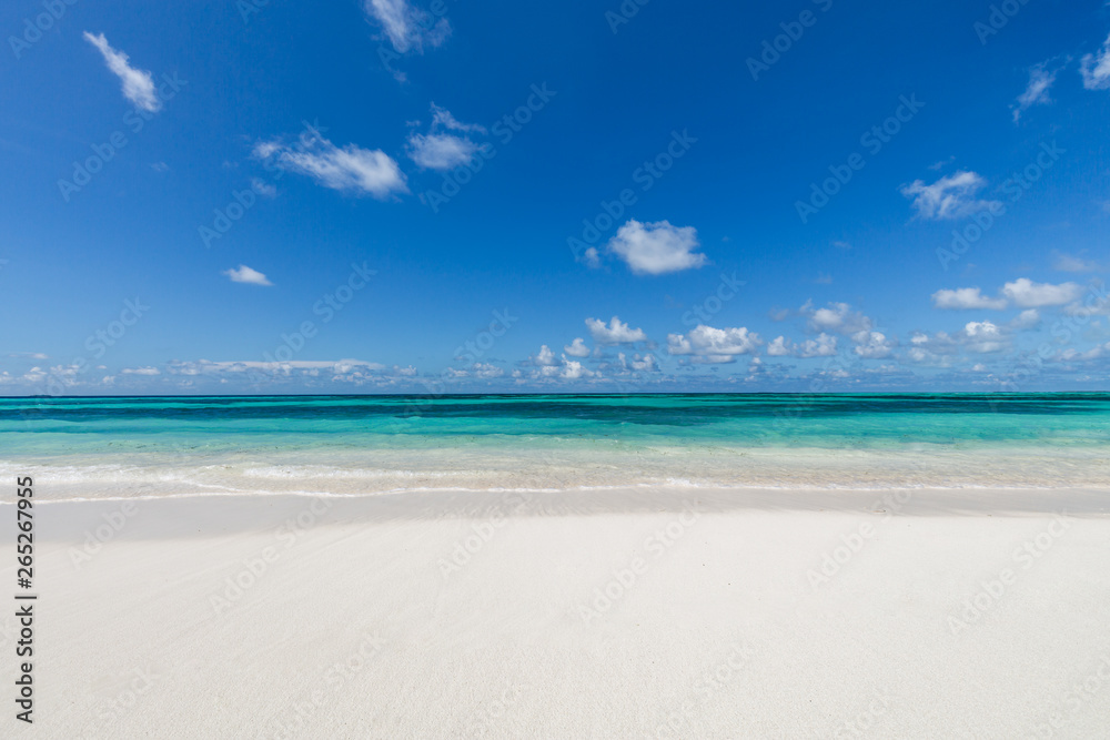Closeup of sand on beach and blue summer sky 