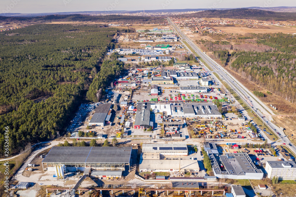 Aerial view from above of industrial buildings, warehouses or factory storages or logistic company