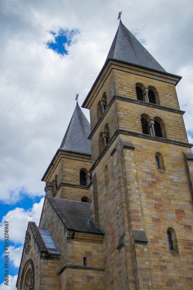 Facade of Abbey of Echternach (Basilica of Saint Willibrord) in the old town of Echternach, Luxembourg