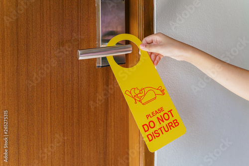 Принти на полотні hand hold yellow please do not dsturb sign