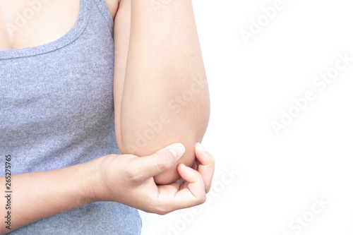 Wallpaper Mural Closeup woman hand holding elbow with pain on white background, health care and medical concept Torontodigital.ca