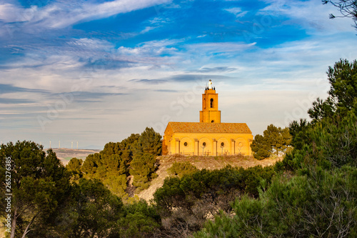 A sunset view to the basilica of El Salvador in Falces, Spain photo