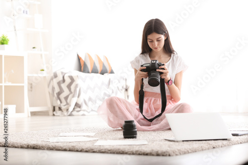 Young girl with modern phot...