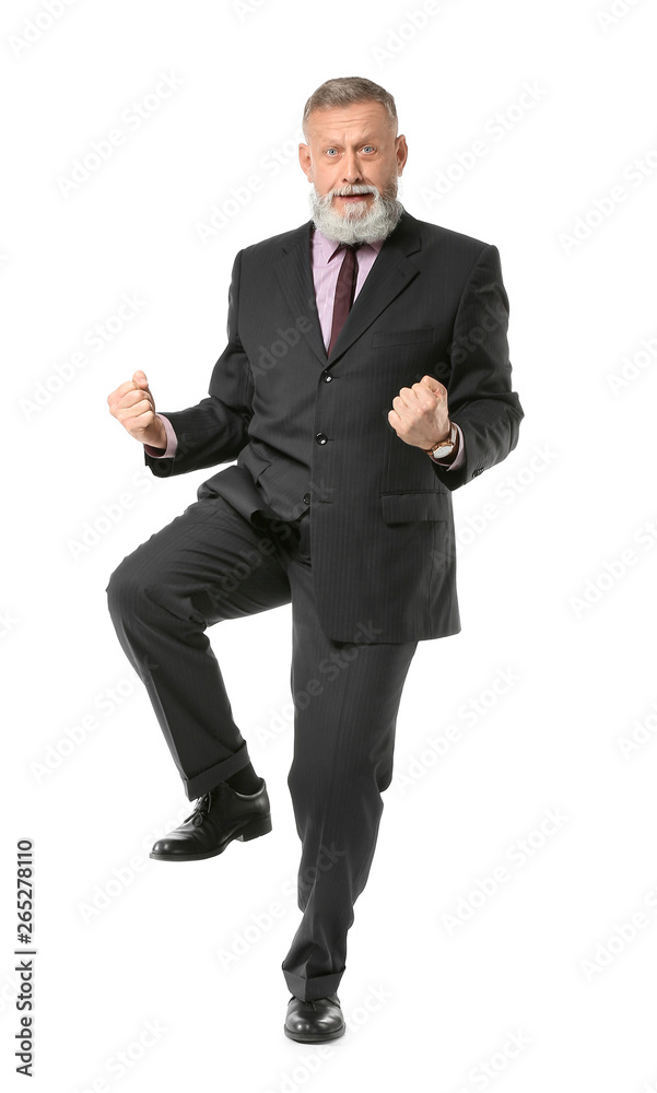 Happy dancing mature businessman on white background Happy dancing mature businessman on white background
