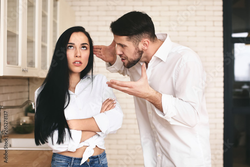 Young couple quarreling in ...