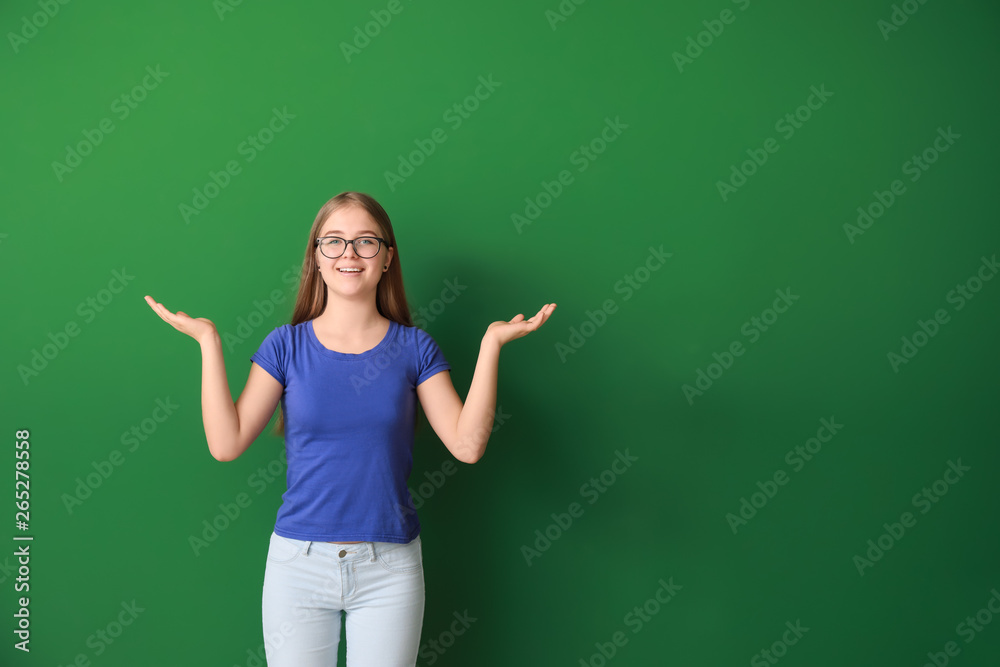 Cute teenage girl on color background Cute teenage girl on color background