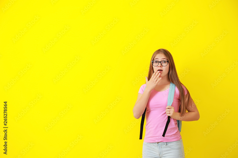 Shocked teenage girl on color background Shocked teenage girl on color background