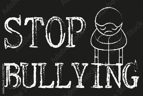 Pizarra negra con stop bullying.