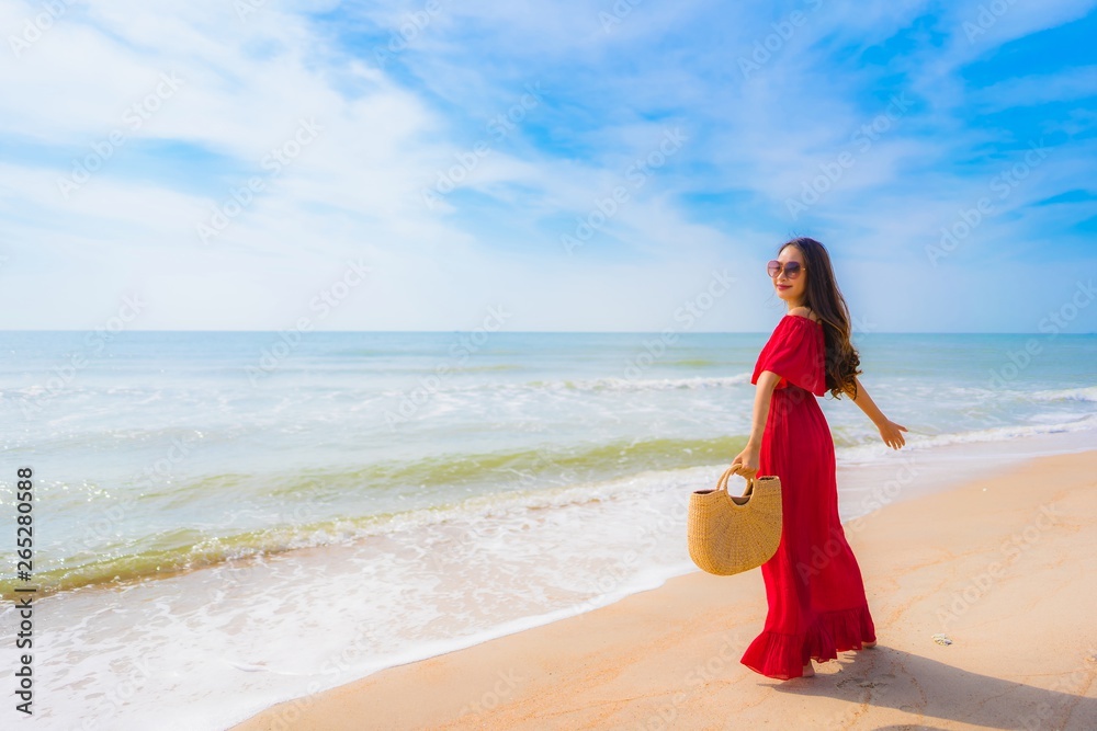 Portrait beautiful young asian woman on the beach and sea Portrait beautiful young asian woman on the beach and sea