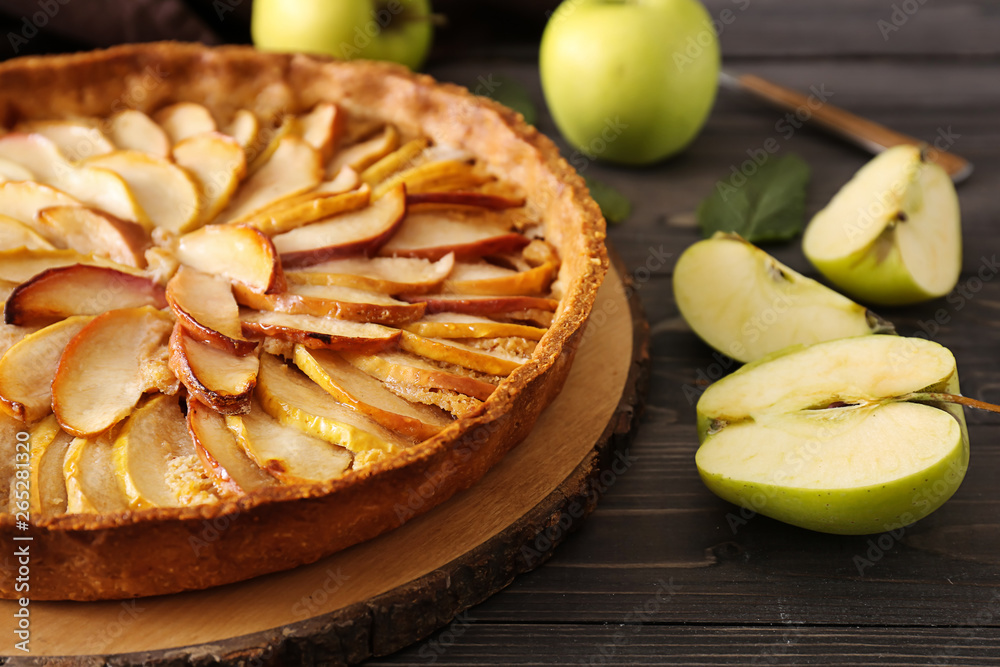 Tasty apple pie on wooden table, closeup Tasty apple pie on wooden table, closeup
