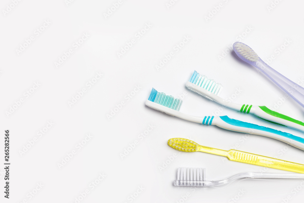 New different toothbrushes on a white background New different toothbrushes on a white background