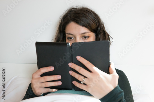 Young woman reading an ebook