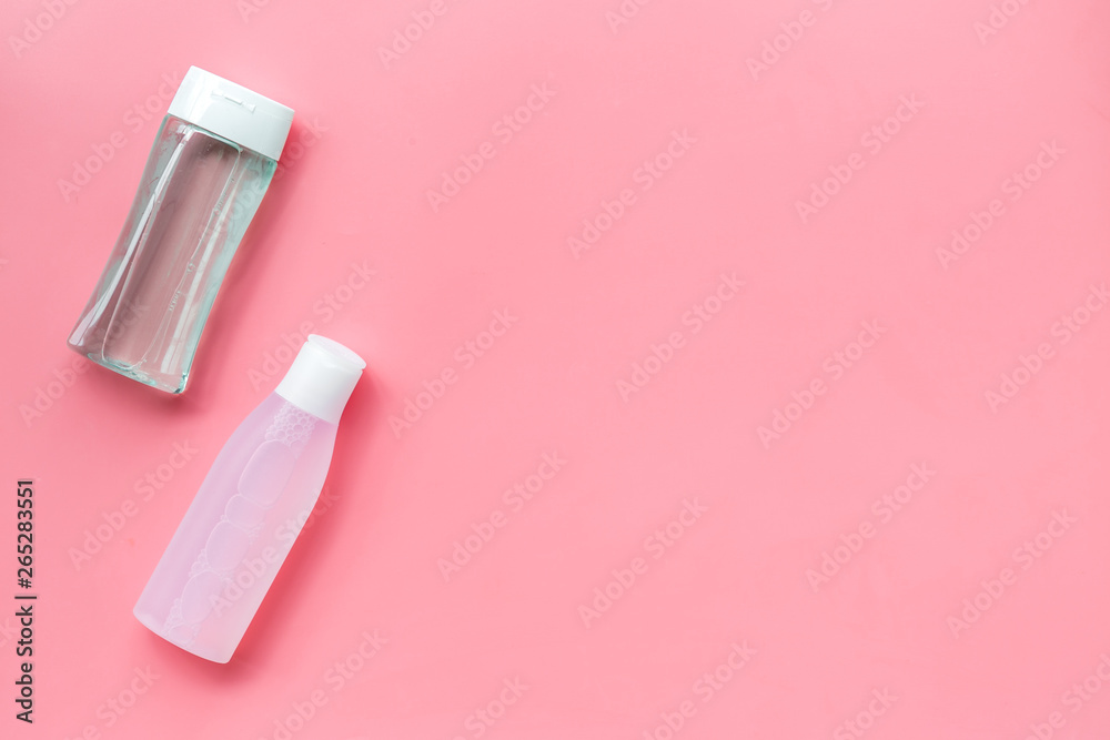 facial tonic and lotion for face care on pink background top view mock up facial tonic and lotion for face care on pink background top view mock up
