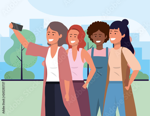 Millenial diverse group taking selfie cityscape background