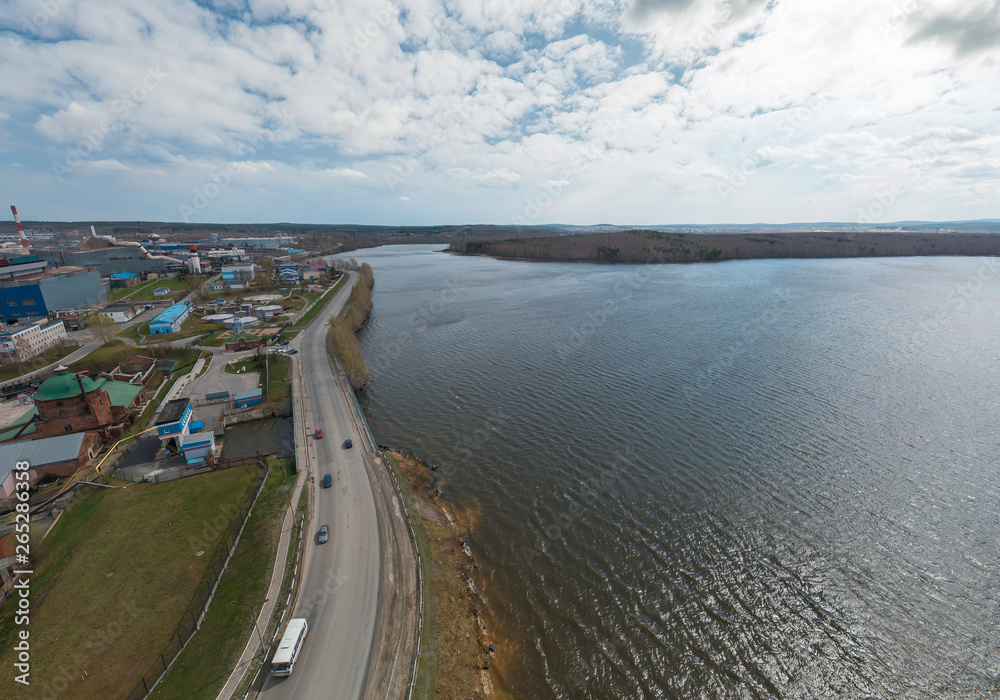 Pond in Polevskoy city, Aerial, spring, cloudy