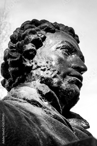 UFA, RUSSIA - 11 APRIL 2019: close-up bust of the Alexandr Sergeevich Pushkin in the sun, greatest russian poet on Pushkin street,  editorial photo photo