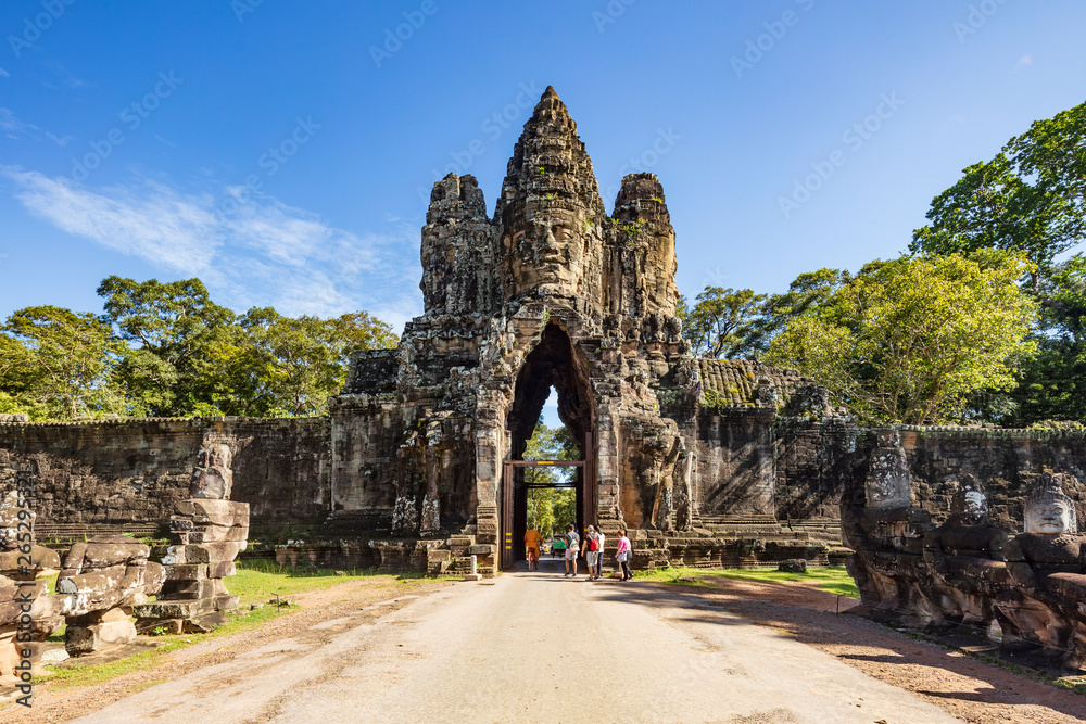 Fototapeta premium Angkor Wat, Cambodia September 6th 2018 : Tourists at the south gate of the Angkor Thom temple complex, Siem Reap, Cambodia