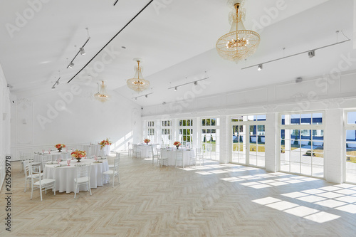 Beautiful white banquet hall. Wedding decor, interior. Banquet service © dimaris