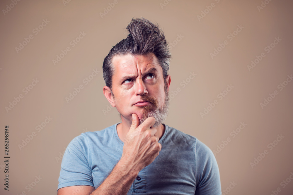 A portrait of man with half beard and hair A portrait of man with half beard and hair