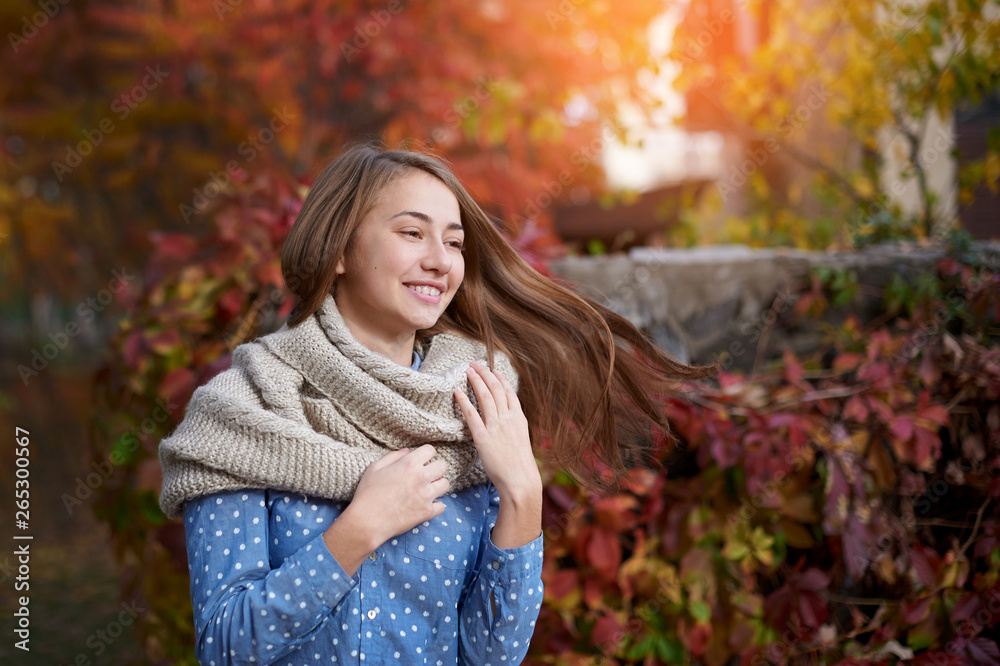 Cute beautiful smile woman walking in red autumn park Cute beautiful smile woman walking in red autumn park