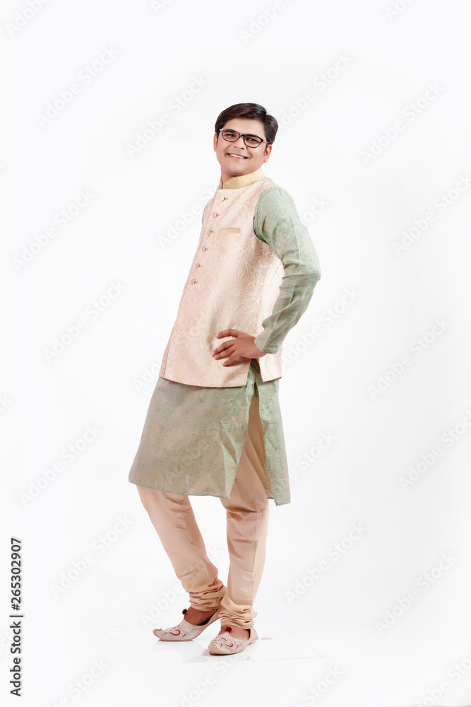 young indian man in traditional wear young indian man in traditional wear