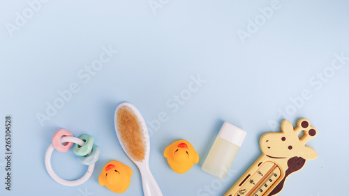 Photography Baby bath products on blue background with copy space
