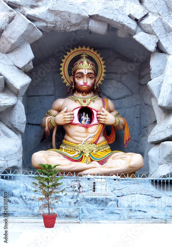 Ancient statue of Hindu god Hanuman in Rishikesh on the ghat near Parmarth Niketan Ashram. India.