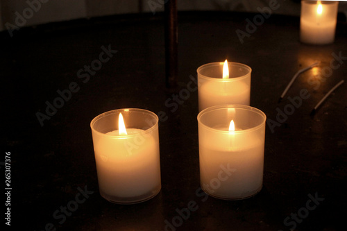 group of candles on dark background