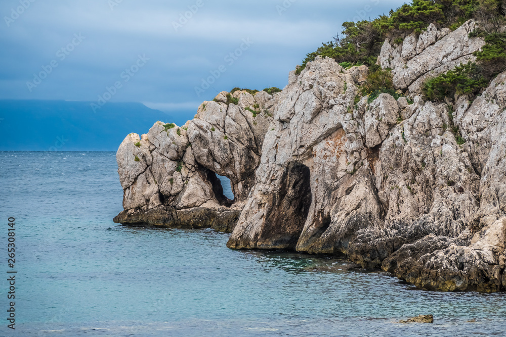 Capo Caccia nature reserve, a rocky outcrop set in a protected ecosystem near the town of Alghero, Sardinia, Italy. featuring. Scenic hiking routes, diving sites & caverns with archaeological remains