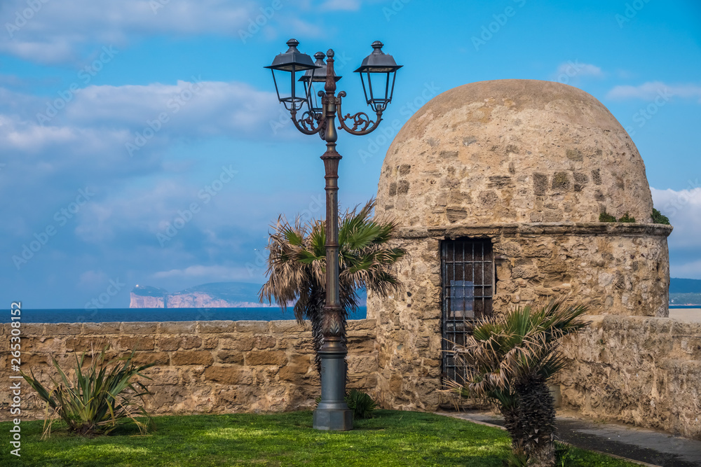 The impressive medieval sea-front ramparts of the city of Alghero (L’Alguer), province of Sassari , northwestern Sardinia, Italy. The impressive medieval sea-front ramparts of the city of Alghero (L’Alguer), province of Sassari , northwestern Sardinia, Italy.