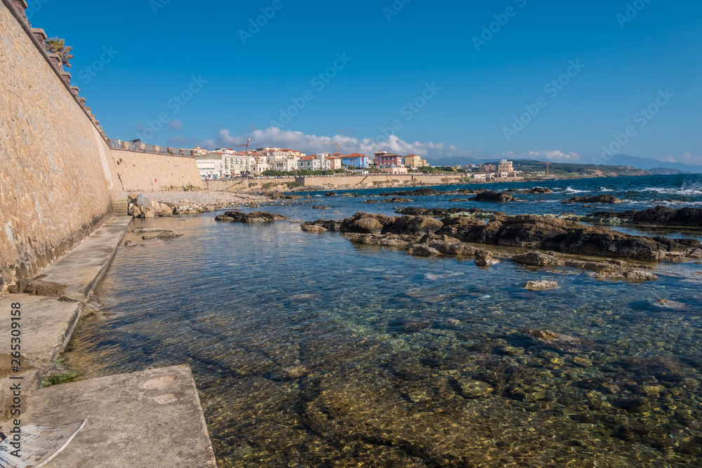 The impressive medieval sea-front ramparts of the city of Alghero (L’Alguer), province of Sassari , northwestern Sardinia, Italy.
