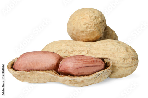 A small pile of peanuts on a white isolated background. Close-up. Macro. Side view.