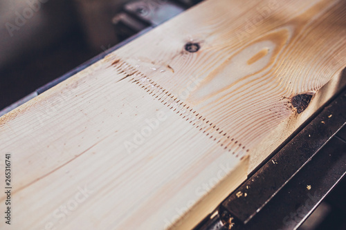 Quadro em tela Close-up of glue joint on conveyor - sawmill - production of glued laminated tim