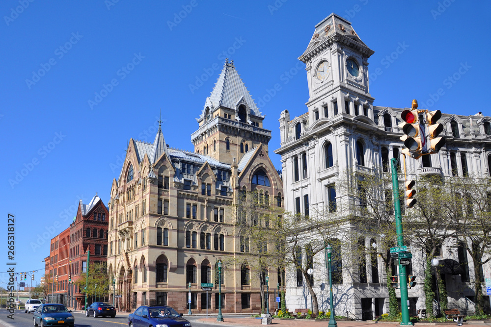 Syracuse savings Bank Building (left) and Gridley Building (right) at Clinton Square in downtown Syracuse, New York State, USA. Syracuse Savings Bank Building was built in 1876 with Gothic style.