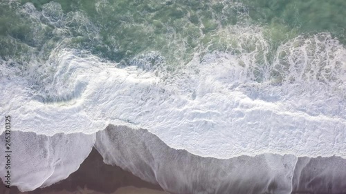 Mare molto mosso con raffiche di vento e onde alte visto dal drone. photo