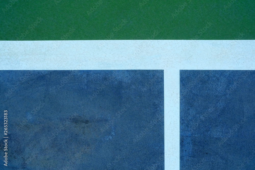 Fototapeta premium Close up White Line of Green Tennis Training Wall Background.
