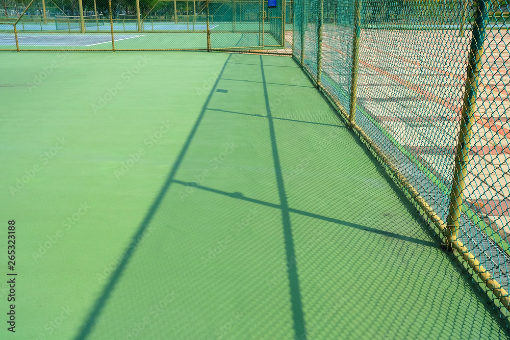 Shadow Fence in Tennis Court.