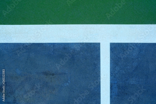 Close up White Line of Green Tennis Training Wall Background.