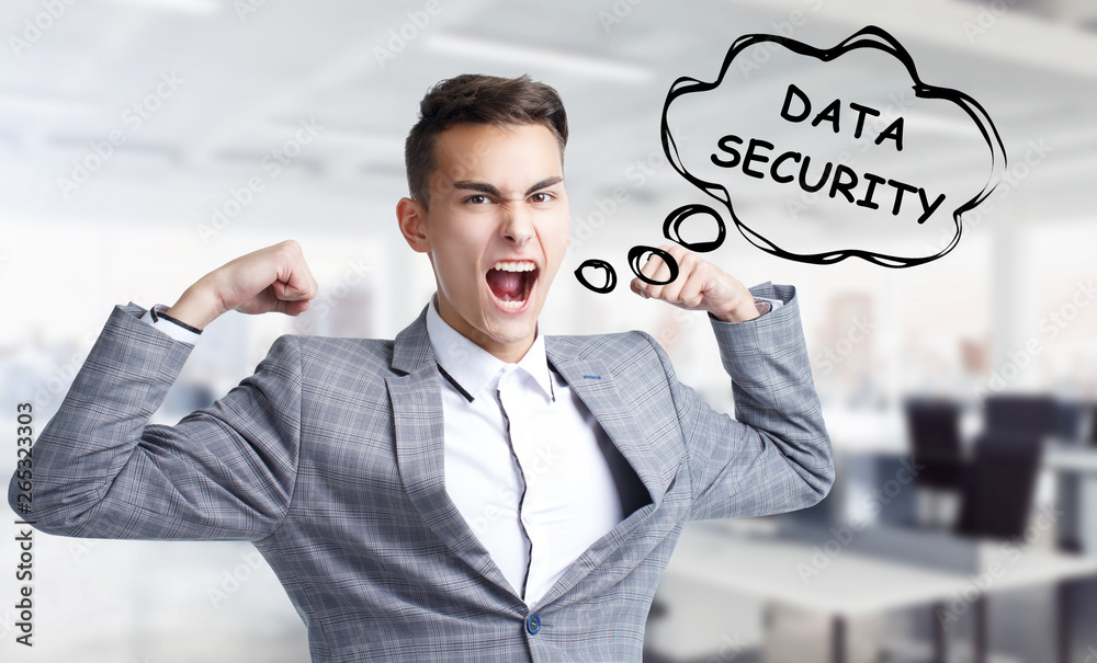 Business, technology, internet and networking concept. Young entrepreneur shouts out a keyword: Data security Business, technology, internet and networking concept. Young entrepreneur shouts out a keyword: Data security