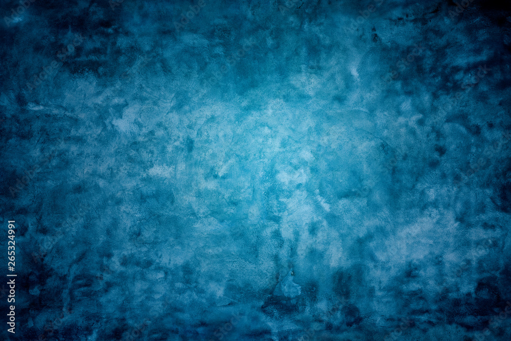 Grunge blue painted cement wall texture background.