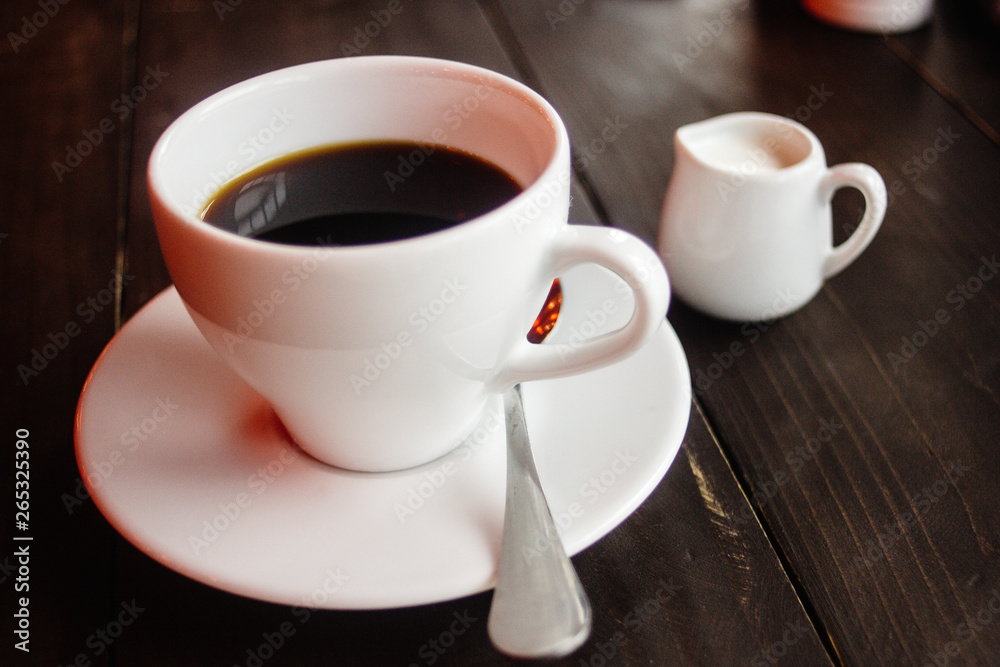 beautiful stylish stunning white cups with coffee and milk on a wooden table beautiful stylish stunning white cups with coffee and milk on a wooden table