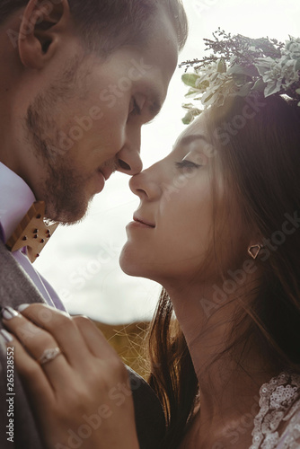 happy gorgeous bride and groom kissing in sun light, sensual perfect moment, boh Fotobehang