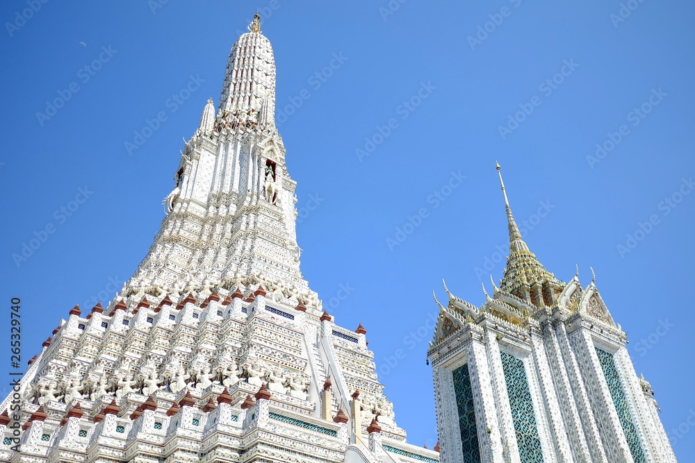 Ancient White Pagoda at Wat Arun Temple where is a Famous of Bangkok, Thailand.